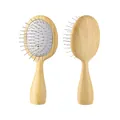 Portable wood grain air cushion hairbrush with steel pins for scalp massage - 824歪脑袋-原色OPP装