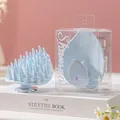 Leaf-shaped blue silicone shampoo brush for scalp massage and effective hair cleansing - PVC Box / Blue