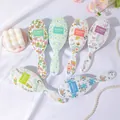 Selection of cute floral print air cushion hairbrushes in various pastel colors and patterns - Oval / 1 Piece / Multicolor