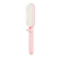 Compact pink foldable travel hairbrush featuring soft white bristles and a hang hole - Pink Folding Comb (131) / Pink