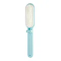 Compact portable mini foldable hairbrush featuring soft white bristles in a light blue finish - Blue