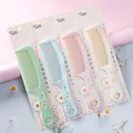 Set of four colorful daisy print hair combs with retail packaging cards and floral decor - CJ04 Style (CJ04 Daisy)
