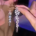 Macro view of elegant leaf-shaped dangling earrings with sparkling marquise stones - Marquise Rhinestone Tassel Earring / Silver (A788银)
