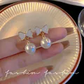 Elegant white butterfly bow pearl drop earrings with 925 silver needle for women - Bowknot Artificial Pearl Style (A955) / Gold
