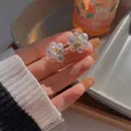 Elegant floral pearl stud earrings with crystal center and 925 silver needle finish. - Artificial Pearl Petal Zirconia Style (E3302) / 1 Pair Pack / Gold