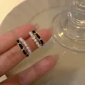 Minimalist pearl and braided chain 925 silver needle earrings in gold and black finish - Pearl Rhinestone and Leather Cord Woven Style (E5638) / Gold