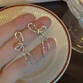Elegant 925 silver needle sparkling bow ribbon earrings with micro-pavé rhinestones - Micro-Pavé Rhinestone Bowknot Style (A1424) / Silver