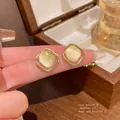 Elegant S925 silver needle square stud earrings with a cat eye stone in gold finish - Rounded Square Cat Eye Style (A1655)