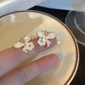 Elegant 925 silver needle butterfly earrings featuring white flower and pink stone - Butterfly Flower Style (A1635) / 1 Pair Pack / Gradient Pink