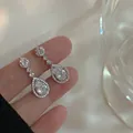 Elegant S925 silver teardrop earrings with clear cubic zirconia for a minimalist look - Teardrop Zirconia Style (A1637) / One Pair / Silver