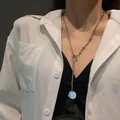Minimalist titanium steel necklace with a round monogram pendant and toggle clasp. - Ring Buckle Style (X325 Silver)