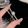 Elegant silver zircon adjustable tennis bracelet featuring a square halo center stone design - Square Halo Round Main Stone Style (S426 Silver) / Silver