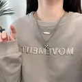Double-layered stainless steel necklace with checkerboard lock pendant and Dream plate. - Black White Bag Tag Style (X804 Silver)