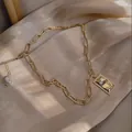 Elegant gold-tone titanium steel chain necklace featuring a crystal rectangular pendant. - Simple Necklace Style (X288 Gold)