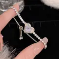 Adjustable silver heart tennis bracelet featuring sparkling cubic zirconia stones - Heart Main Stone Style (S487 Silver) / Silver