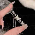 Elegant silver butterfly bracelet with sparkling zircon stones and adjustable drawstring - Three Butterflies Slider Style (S321 Silver) / Silver
