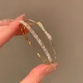 Elegant gold plated zircon cuff bracelet with sparkling bow and pavé crystal band detail - Square Zirconia Double Layer Bowknot Open Bangle (S677 White) / Gold