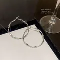 Elegant silver twisted hoop earrings with minimalist European and American design - Twisted Plain Hoop (E6050) / Silver