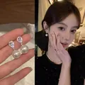 Elegant white pearl drop earrings featuring pear-shaped cubic zirconia for women - Pear-Shaped Zirconia Pearl Drop Earrings (A1411) / Silver