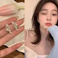 Elegant multi-pearl stud earrings with zircon accents in golden finish for women - Multi-Pearl Streamline Artificial Pearl Zirconia Style (E6051 Silver) / Silver