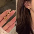 Elegant high-quality gold knot stud earrings for a minimalist Korean fashion look - Metal Knot Style (A2009 Gold) / Gold