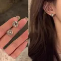 Elegant silver-colored knotted stud earrings for women with minimalist Korean design - Metal Knot Style (A2009 Silver) / Silver