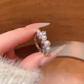 Elegant silver-tone ring featuring delicate pearls and sparkling crystals for women - Gradient Pearl (J1069) / Adjustable Open Ring / Silver