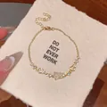 Elegant gold-toned zircon bracelet with cute cat charm and adjustable extender chain - Cat Shape Opal Style (S846金) / Gold