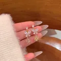 Elegant butterfly drop earrings with sparkling clear crystals and 925 silver needles - Bowknot Starburst Ball Tassel Style (E6786)