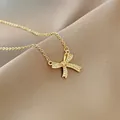 Elegant gold plated necklace featuring a sparkling cubic zirconia bow pendant SKU - Full Zircon Bowknot Style (X730 Gold) / Gold