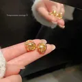 Elegant gold-tone twisted knot metal earrings with a luxury temperament design. - Twisted Knot Style (A2009 Gold) / Gold