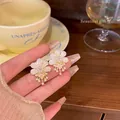 Elegant floral tassel earrings featuring S925 silver needle, rhinestones, and pearls - Frosted Flower Pearl Tassel Style (A999) / Gold