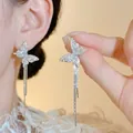 Elegant silver rhinestone butterfly tassel earrings with S925 silver needle finish - Rhinestone Butterfly Tassel Style (A1633) / Silver