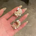 Elegant white flower earrings with gold accents and a pearl-like finish for spring - Flower Ball and Hoop Stud Set / Gold White