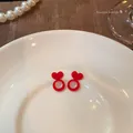 Red heart-shaped silicone earring back stoppers for earring support and stabilization - Red
