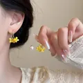 Fresh yellow flower earrings with elegant white pearl detail for women - 清新珍珠耳钩花朵款(A2267)