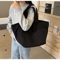 Schwarze Canvas-Einkaufstasche mit Stickerei für Damen - L / Schwarz