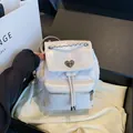 Mini sac à dos matelassé blanc avec fermoir cœur et chaîne - Blanc