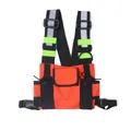 High-visibility orange tactical chest rig bag with gray reflective strips and straps. - Red