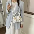 Stylish white ruched cloud handbag featuring a unique marble bead handle decoration - White With Pendant / White