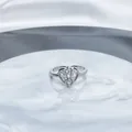 Detailed macro view of a silver adjustable ring featuring a heart-shaped crystal setting. - Style 8 Heart Motif Full Diamond / Adjustable Open