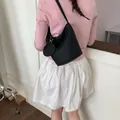 Elegant black large capacity leather bucket bag for women stylish daily commuting - Shoulder Bucket Bag (With Pouch) / Black