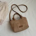 Stylish brown textured bucket handbag featuring adjustable shoulder strap for women - Without Pendant / Brown