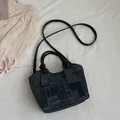 Stylish dark denim print bucket handbag featuring black shoulder strap and top handles - Without Pendant / Black
