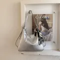 Elegante borsa multifunzione argento da donna, utilizzabile come zaino o borsa a spalla - Stile Con Ciondolo / Argento