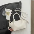 Schicke cremeweiße große Umhängetasche mit modischen geknoteten Henkeldetails - Einzelne Tasche / Gebrochenes Weiß
