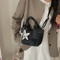 Fashionable small black bucket handbag for women with silver star charm detail - With Pendant / Black