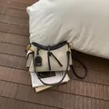 Elegante bolso bandolera de lona beige y cuero negro para el ocio de las mujeres - S / Negro