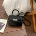 Elegant minimalist black glossy leather small square handbag with silver metal buckle - Standard Type / Black