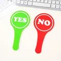 Set of green YES and red NO hand-held indicator paddles for interactive photo props. - YES/NO (Double-Sided)